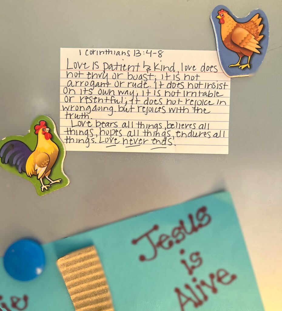 Handwritten Bible verse on an index card on a refrigerator, demonstrating simple Bible reading habits for women.